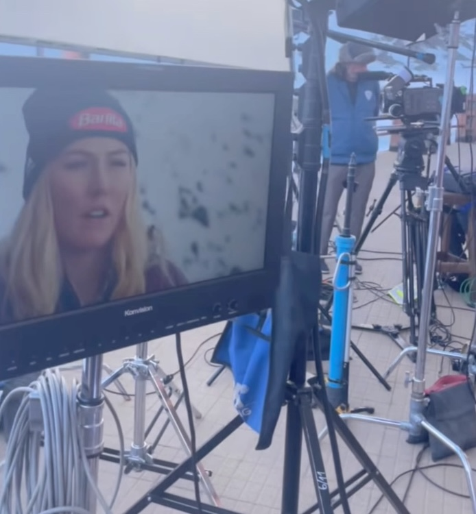 Production monitor displaying an interview with Olympic skier Mikaela Shiffrin on the ABSA Films set at Portillo Ski Resort, Chile.